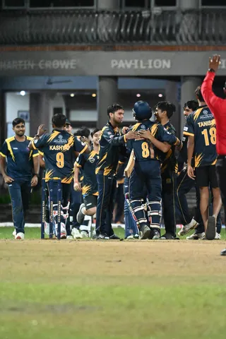 Doiwala Kings players beside the boundary