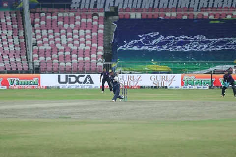 Nainital Tigers batter completing a shot