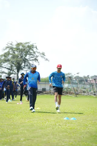Nainital Tigers players walking onto the ground